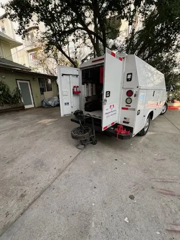 Magnet Plumbing service vehicle on-site for Grease Trap Cleaning in San Je Village
